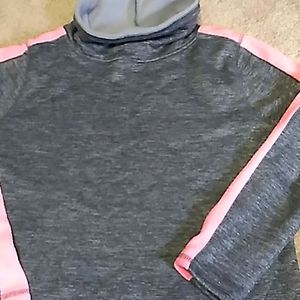 Stylish Xersion gray with pink stripe down sleeve.